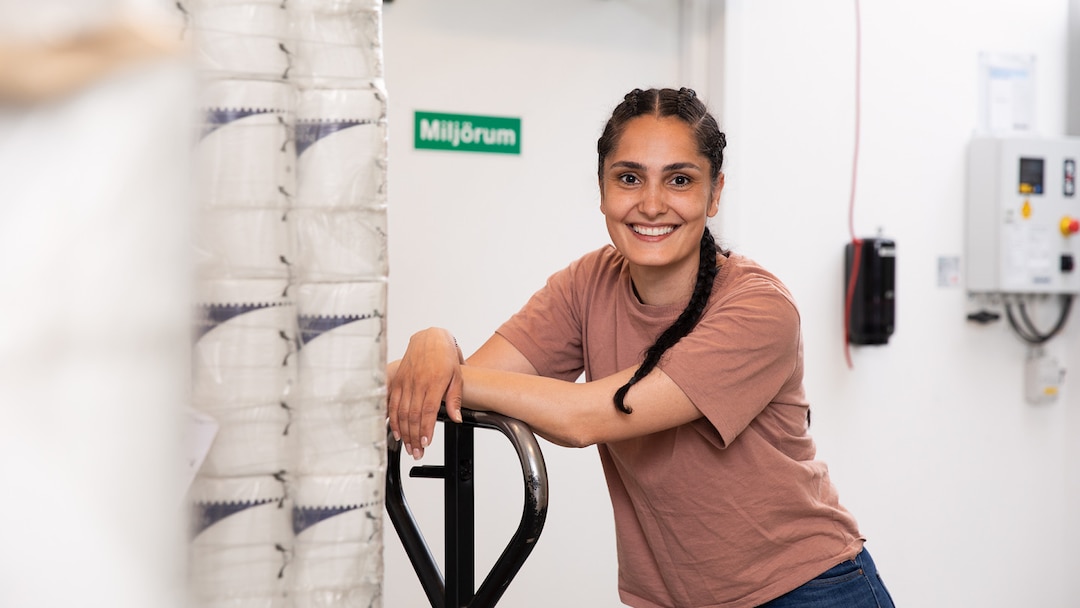 Smiling Woman With Pallet Lift